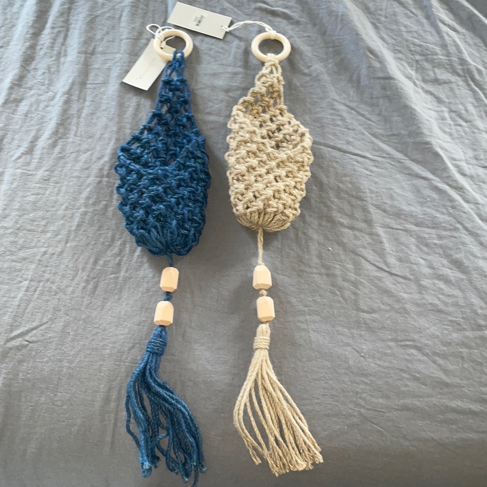 Two Bloomingville macramé wall hanging planters with beads and tassels